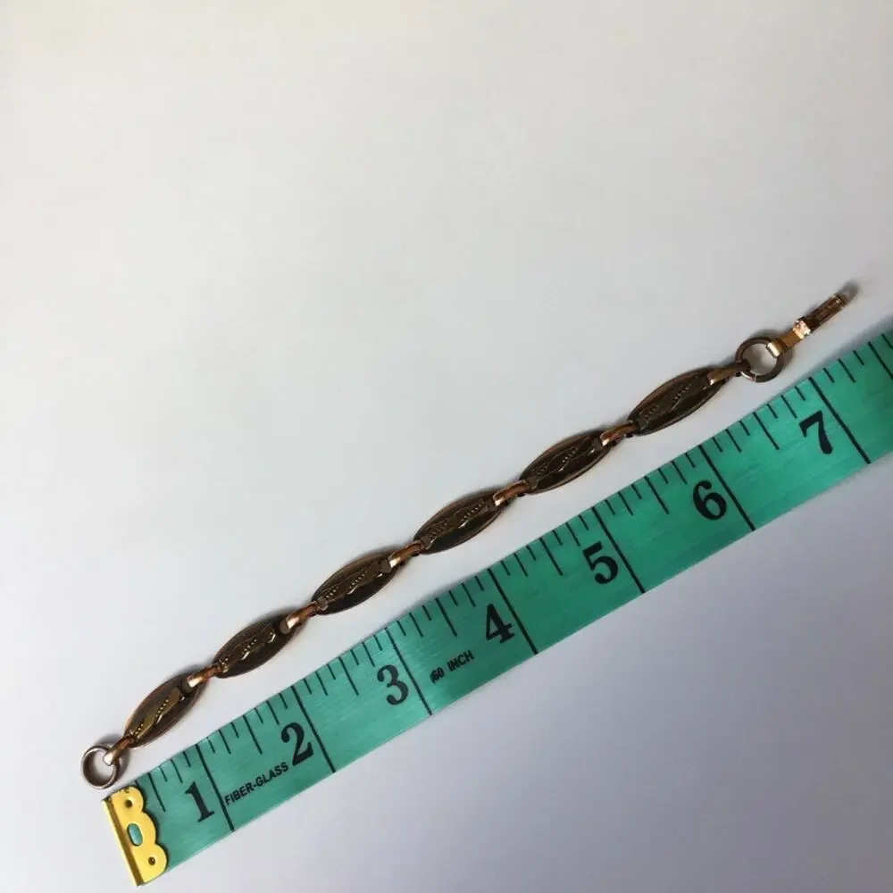Copper tone abstract design link bracelet
